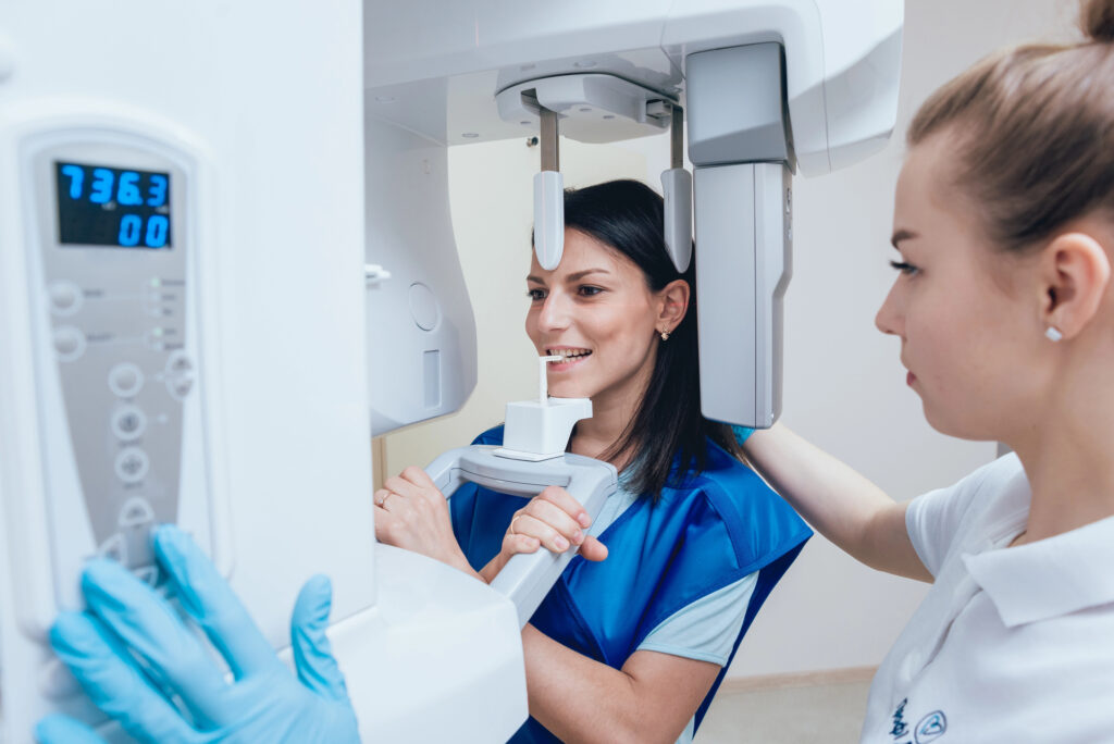 Patient undergoing a dental X-ray during a cosmetic dentistry evaluation in Los Angeles